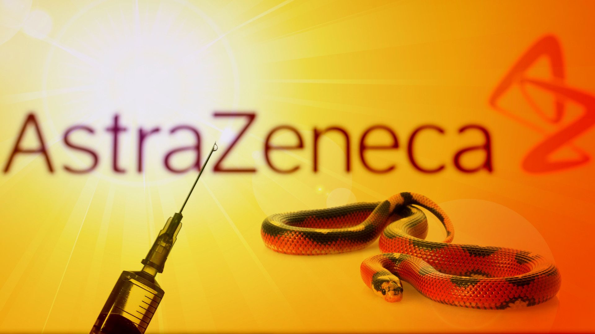 16. Was bedeutet AstraZeneca?. A vivid graphic featuring the logo of AstraZeneca with a syringe positioned to its left and a coiled red and black serpent to the right, set against a radiant yellow background. Opens a video in a new window.