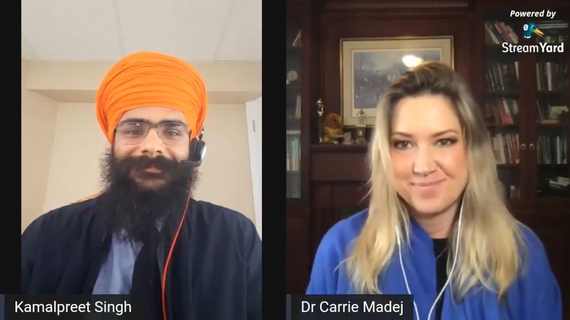 13. Interview mit Dr. Carrie Madej über die Impfagenda. A split-screen video conference image showing two speakers. On the left, a man with a beard and a bright orange turban, identified as Kamalpreet Singh, wearing headphones; on the right, a woman with blonde hair, identified as Dr. Carrie Madej, also wearing headphones. Both are smiling and appear engaged in a discussion. Opens a video in a new window.