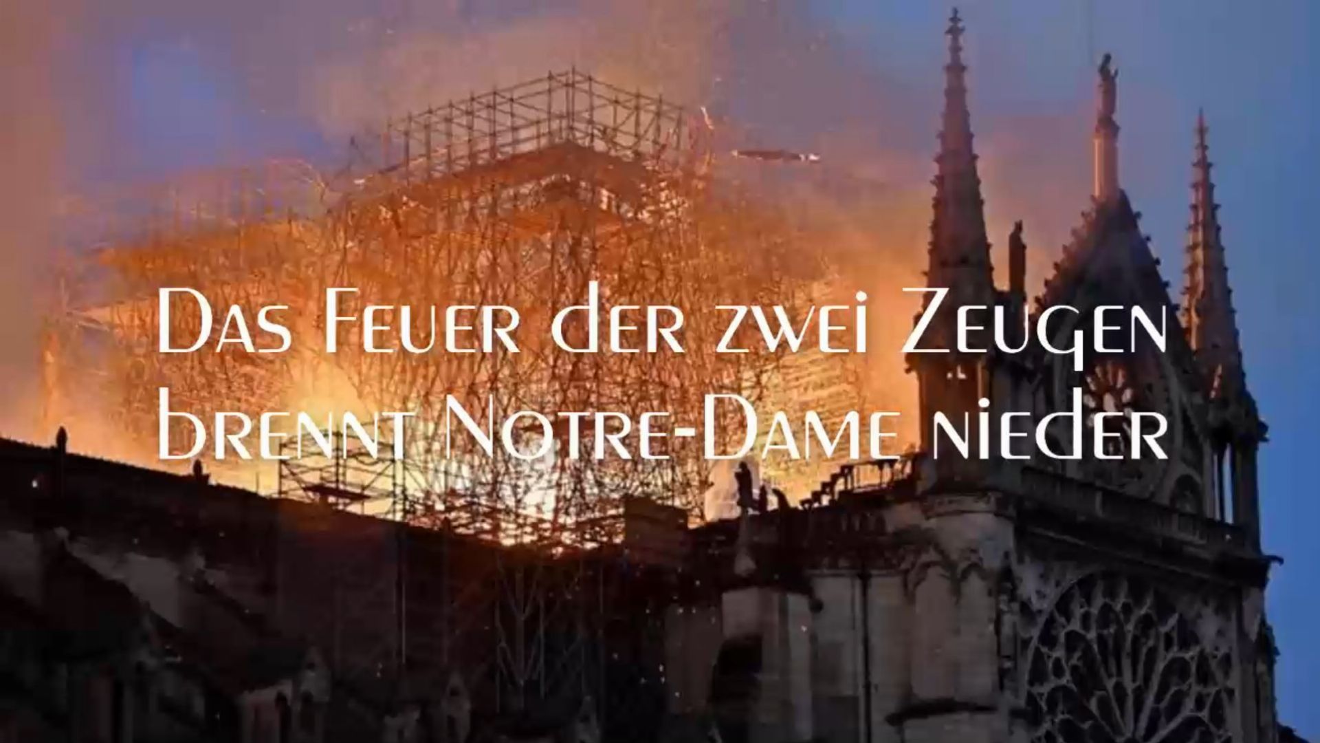 8. Das Feuer der zwei Zeugen brennt Notre Dame nieder. Image showing the Notre-Dame Cathedral surrounded by scaffolding, under a blaze, overlaid with German text "Das Feuer der zwei Zeugen brennt Notre-Dame nieder." Opens a video in a new window.