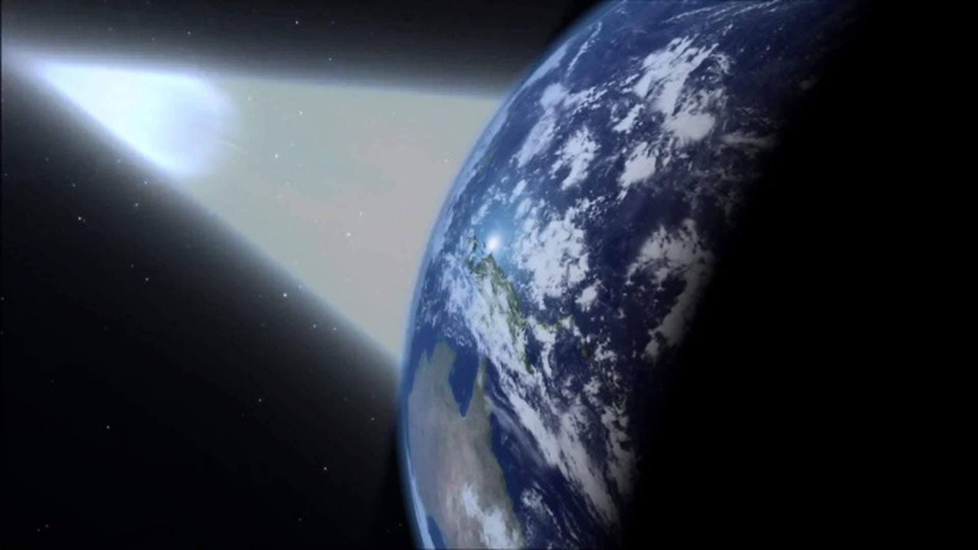 5. Gamma Ray Bursts. A digital depiction of Earth from space, showing the planet partially illuminated by sunlight against a backdrop of stars, with a bright comet passing in the near distance. Opens a video in a new window.