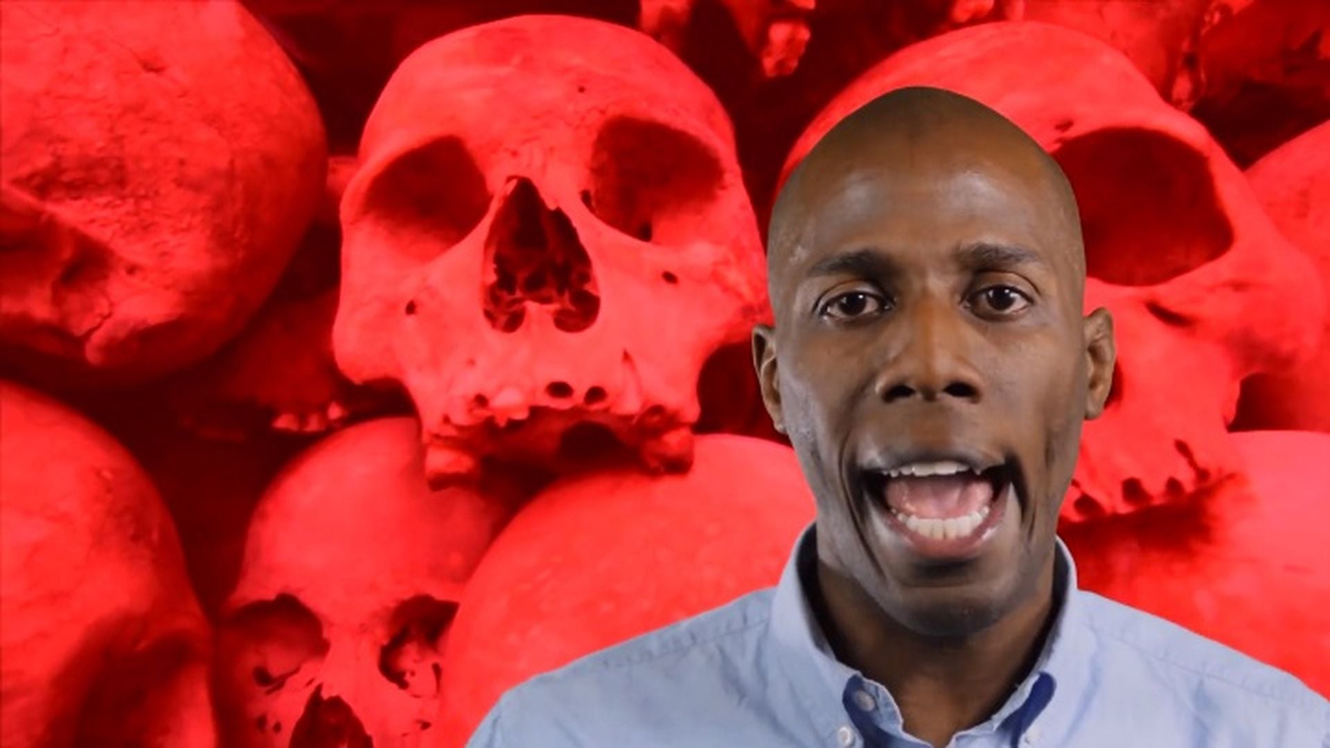 11. POPE FIGHTS BACK!. An African American man, appearing surprised or speaking emphatically, is standing in front of a vividly red background adorned with multiple skull images. Opens a video in a new window.