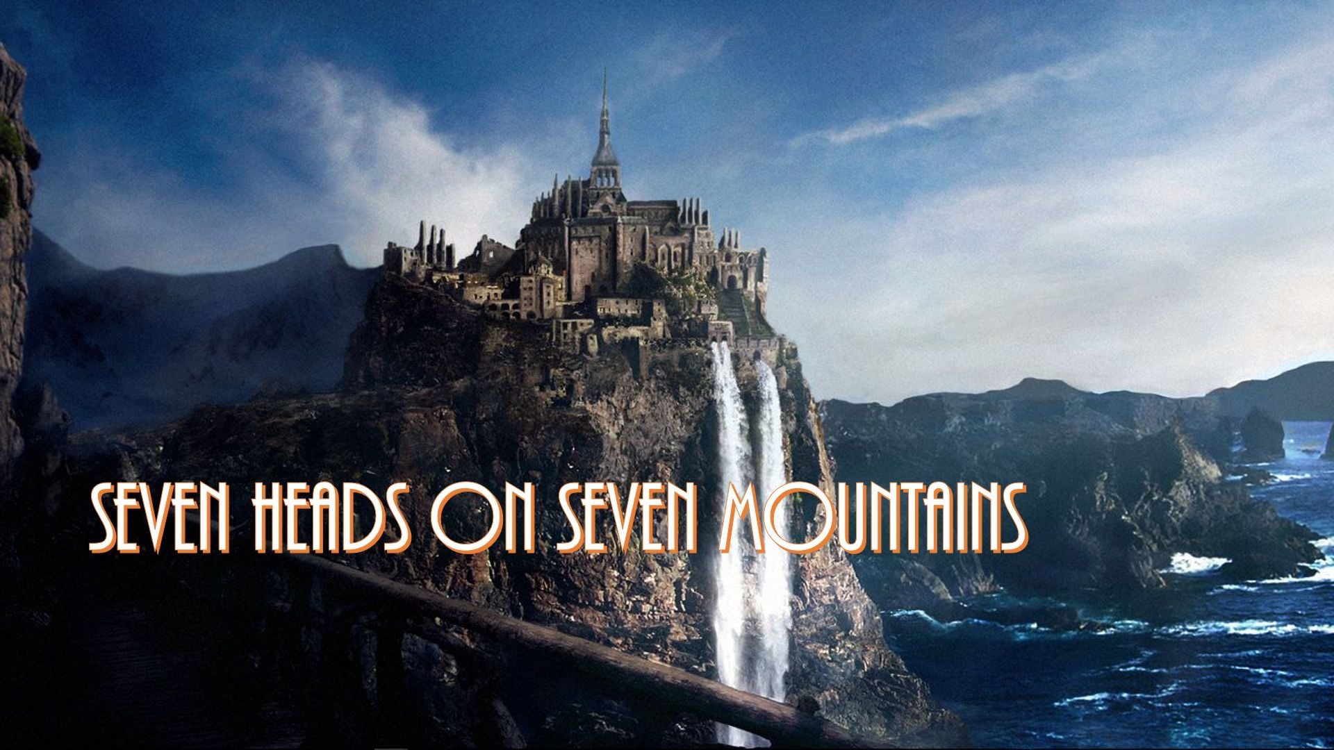 17. Seven Heads on Seven Mountains. An illustrious castle perched atop a steep cliff with a cascading waterfall, overlooking a turbulent ocean under a cloudy sky. The image includes the text "SEVEN HEADS ON SEVEN MOUNTAINS" in bold letters. Opens a video in a new window.