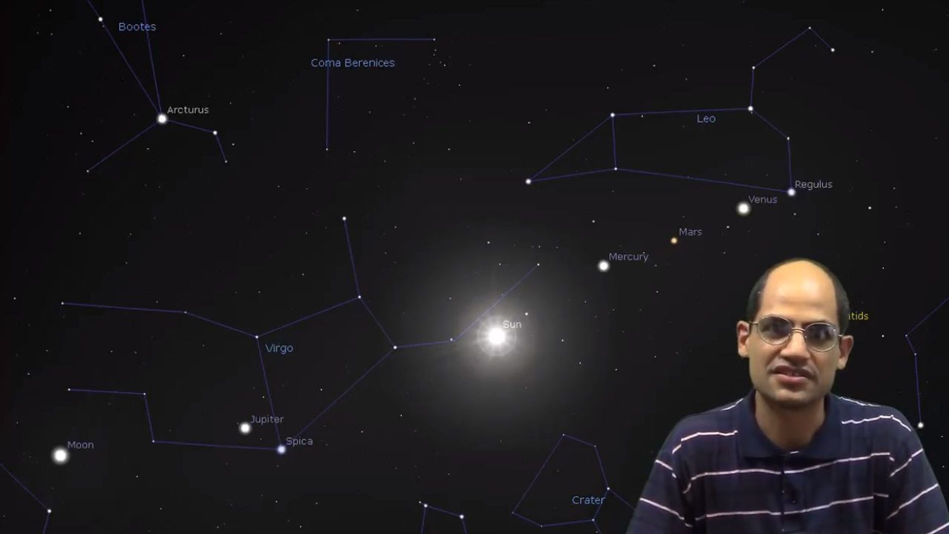 2. La Gran Señal aparece durante la Cuarta Trompeta. A man with glasses, wearing a striped shirt, appears in front of a digital backdrop depicting a starry sky map with labeled celestial bodies and constellations, including the brighter stars and planets like Mars, Mercury, and Jupiter. Opens a video in a new window.