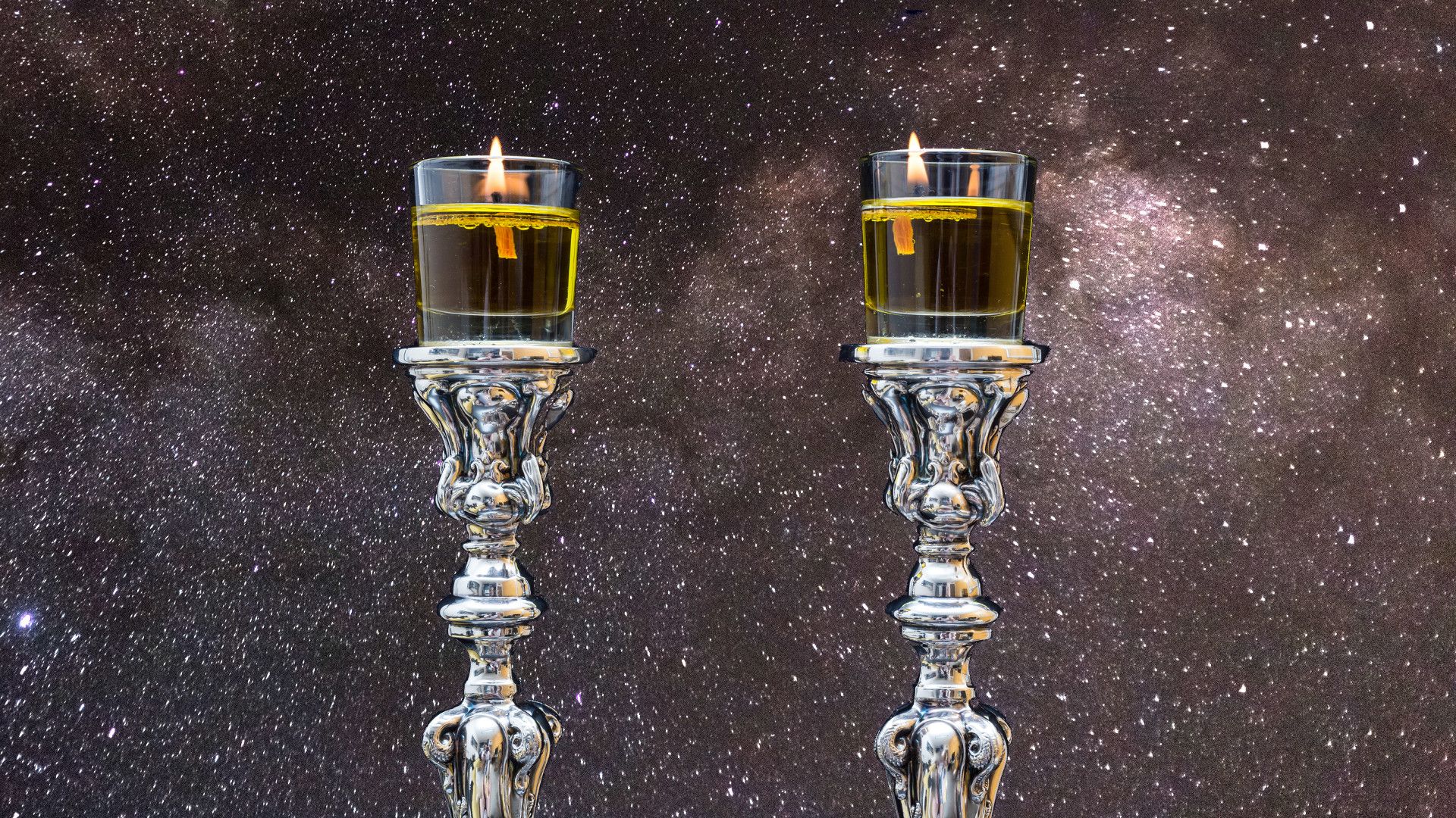 8. The Two Witnesses in the Stars. Two ornate silver candleholders with lit candles against a backdrop of a star-filled sky, suggesting a celestial celebration or reflection. Opens a video in a new window.