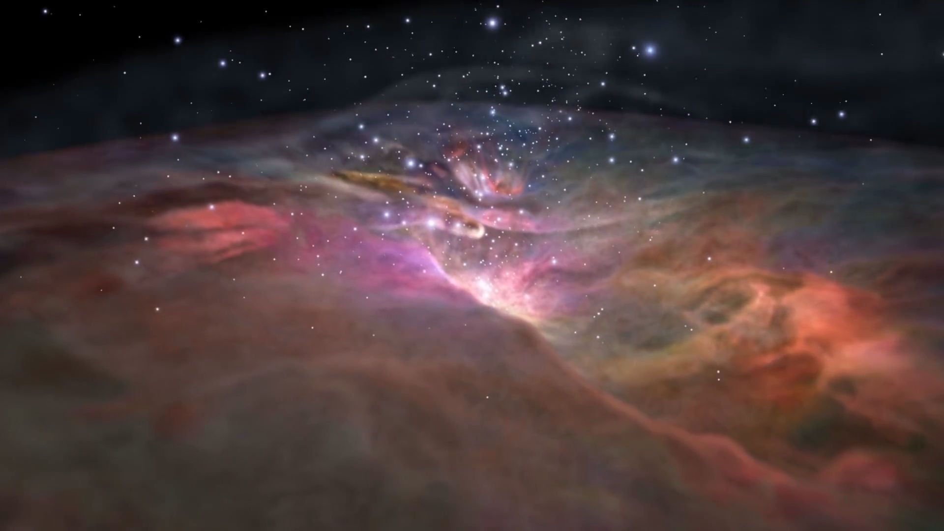10. Reise zum Orion-Nebel. A vibrant depiction of a celestial region with radiant colors of pink, purple, and orange across nebulous formations, set against a backdrop of distant stars in the cosmos. Opens a video in a new window.