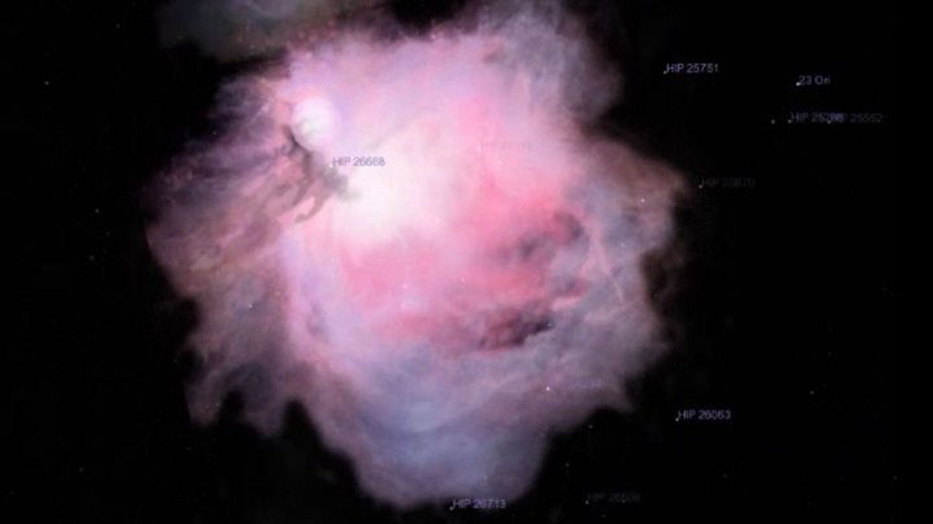 2. Viaje a la Nebulosa de Orión. A celestial nebula illuminated in hues of pink and white, surrounded by darkness, with stars pinpointed by their astronomical catalog numbers. Opens a video in a new window.