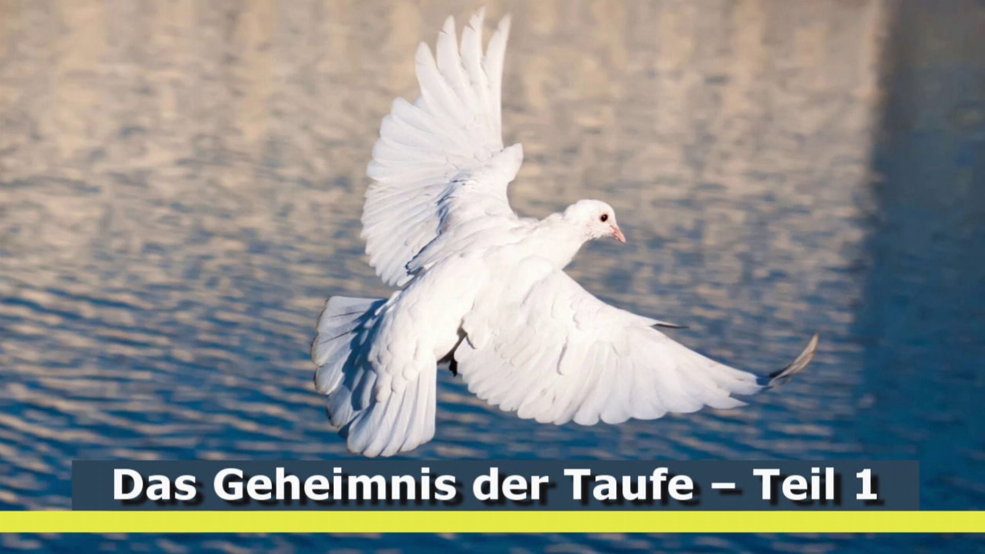 2. Das Geheimnis der Taufe. A white dove with fully spread wings gracefully descends over a body of water. The image includes text at the bottom reading "Das Geheimnis der Taufe - Teil 1" which translates to "The Mystery of Baptism - Part 1." Opens a video in a new window.